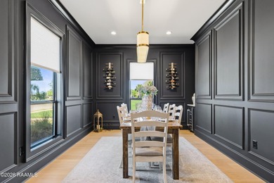 Located in the prestigious gated golf community of Le Triomphe