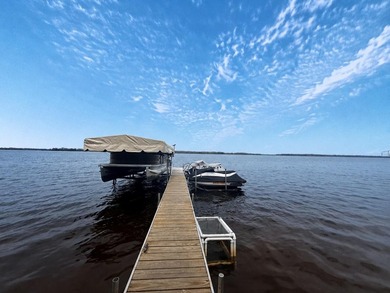 Experience stunning lakefront living in this spacious 4-bedroom - photo 25