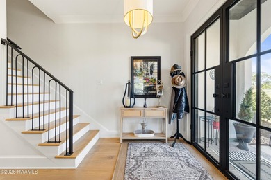 Located in the prestigious gated golf community of Le Triomphe