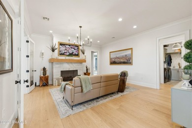 Located in the prestigious gated golf community of Le Triomphe