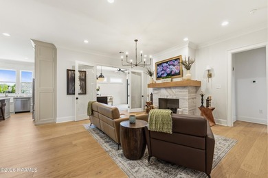 Located in the prestigious gated golf community of Le Triomphe