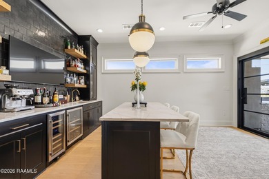 Located in the prestigious gated golf community of Le Triomphe