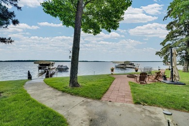 Experience stunning lakefront living in this spacious 4-bedroom - photo 37