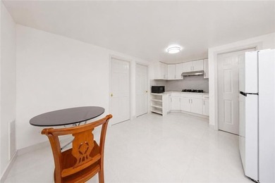 Exceptional, fully renovated legal two-family brick property - photo 9