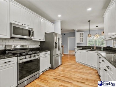 228 Ames Bury Pt. is a beautifully appointed 2-story brick home - photo 5
