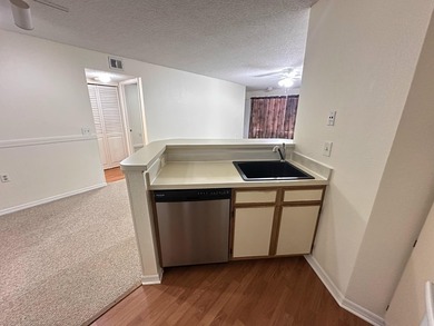 This cozy 1/1 condo features an open living/dining area with a - photo 4