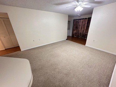 This cozy 1/1 condo features an open living/dining area with a - photo 6
