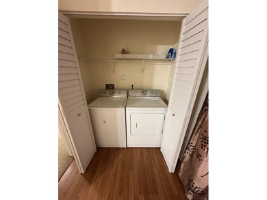 This cozy 1/1 condo features an open living/dining area with a - photo 9