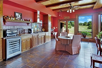 With more than 6,000 square feet under roof and over 56 acres of - photo 13