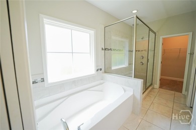 Welcome to the gated Woodlands Villas at Southbridge, where this - photo 15