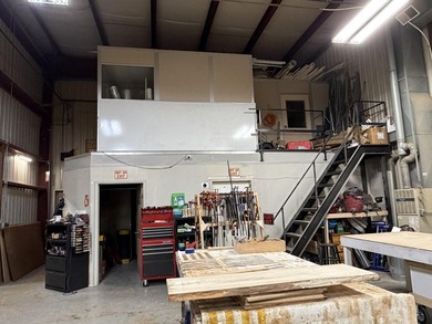 A 9,569 s.f. Industrial Building sitting on .59 acres. 6,400 s.f - photo 7