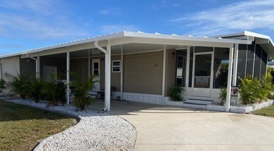 Listed by the Official Sales Team of Jamaica Bay Village. Move - photo 1