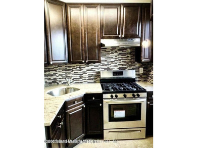 Discover this Large Fabulous Impeccable, 3 Family Home. This - photo 2
