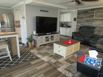 Listed by the Official Sales Team of Jamaica Bay Village. Move - photo 3