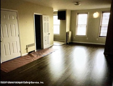 Discover this Large Fabulous Impeccable, 3 Family Home. This - photo 3