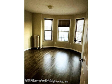 Discover this Large Fabulous Impeccable, 3 Family Home. This - photo 4