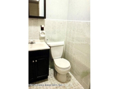 Discover this Large Fabulous Impeccable, 3 Family Home. This - photo 5