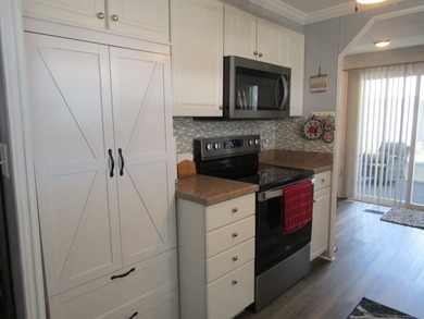Listed by the Official Sales Team of Jamaica Bay Village. Move - photo 6