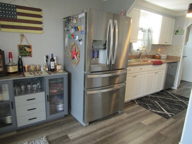 Listed by the Official Sales Team of Jamaica Bay Village. Move - photo 7