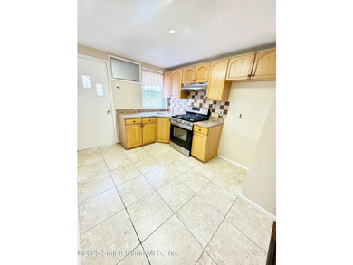 Discover this Large Fabulous Impeccable, 3 Family Home. This - photo 8