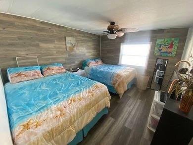 Listed by the Official Sales Team of Jamaica Bay Village. Move - photo 9
