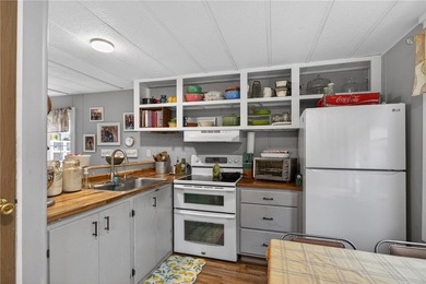 Tucked away on 9.98 secluded acres, this 3 bedroom, 1 bath home - photo 7