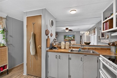 Tucked away on 9.98 secluded acres, this 3 bedroom, 1 bath home - photo 8
