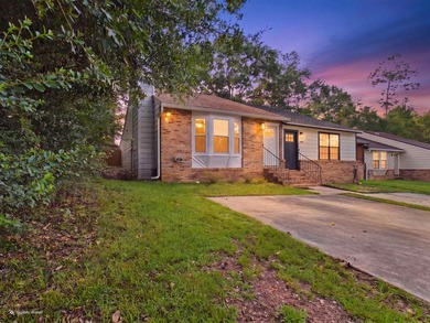This corner-lot townhouse sits just off Park Ave with easy - photo 1