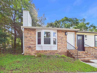 This corner-lot townhouse sits just off Park Ave with easy - photo 3