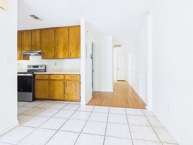 This corner-lot townhouse sits just off Park Ave with easy - photo 8