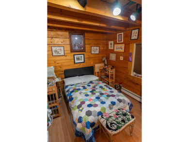The main unit features 3 bedrooms and 1.5 baths, HWBB heat, plus - photo 14