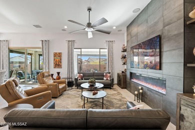 Set on a premium corner lot in the prestigious, gated 55+