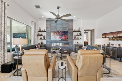 Set on a premium corner lot in the prestigious, gated 55+