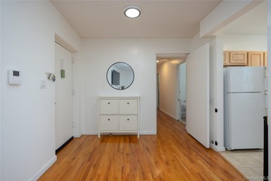 Welcome to this bright and inviting 2-bedroom, 1-bathroom co-op - photo 2