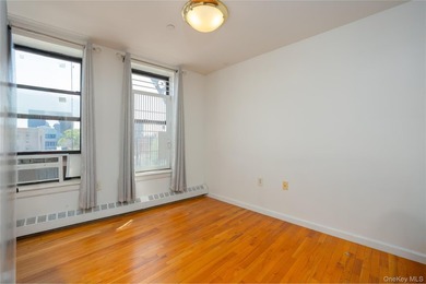 Welcome to this bright and inviting 2-bedroom, 1-bathroom co-op - photo 4