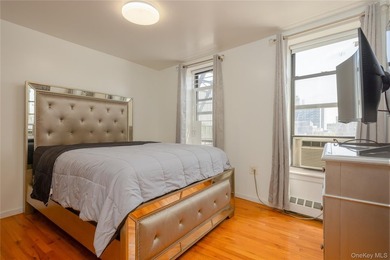 Welcome to this bright and inviting 2-bedroom, 1-bathroom co-op - photo 10