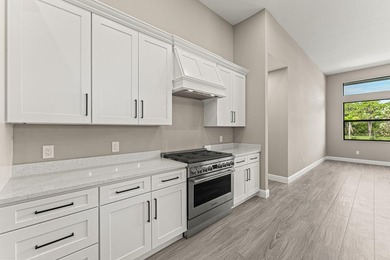 Welcome to 16631 132nd Terrace North, a newly completed custom - photo 14