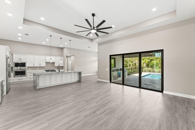 Welcome to 16631 132nd Terrace North, a newly completed custom - photo 15