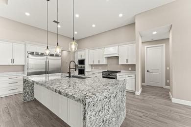 Welcome to 16631 132nd Terrace North, a newly completed custom - photo 17