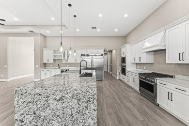 Welcome to 16631 132nd Terrace North, a newly completed custom - photo 18