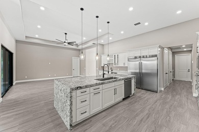 Welcome to 16631 132nd Terrace North, a newly completed custom - photo 19