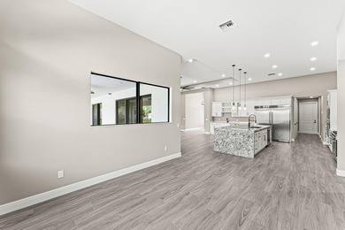 Welcome to 16631 132nd Terrace North, a newly completed custom - photo 21