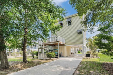 Inlet Living at Its Best! Welcome to this charming raised beach