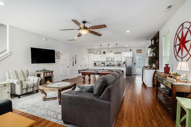 Inlet Living at Its Best! Welcome to this charming raised beach