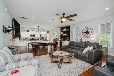 Inlet Living at Its Best! Welcome to this charming raised beach