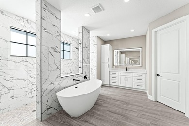 Welcome to 16631 132nd Terrace North, a newly completed custom - photo 28