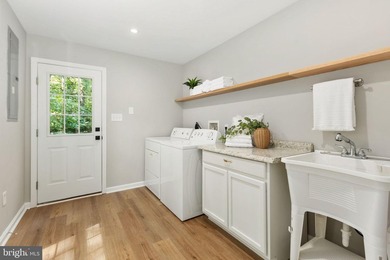 Welcome to this beautifully renovated waterfront retreat on the - photo 30