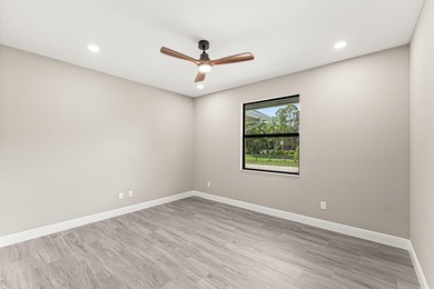 Welcome to 16631 132nd Terrace North, a newly completed custom - photo 33