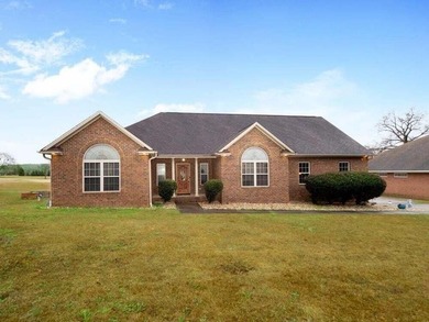 Welcome to this beautiful 4 bedroom brick home with overlooking - photo 1