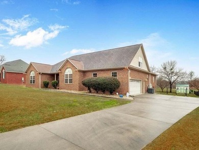 Welcome to this beautiful 4 bedroom brick home with overlooking - photo 2